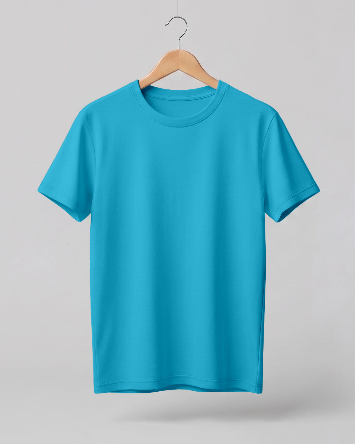 Aqua Blue plain half sleeve round neck t-shirt made from premium cotton, 180 GSM red label yarn, biowashed for softness and durability.