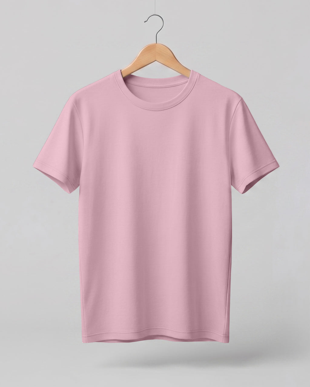 Baby Pink plain half sleeve round neck t-shirt made from premium cotton, 180 GSM red label yarn, biowashed for softness and durability.