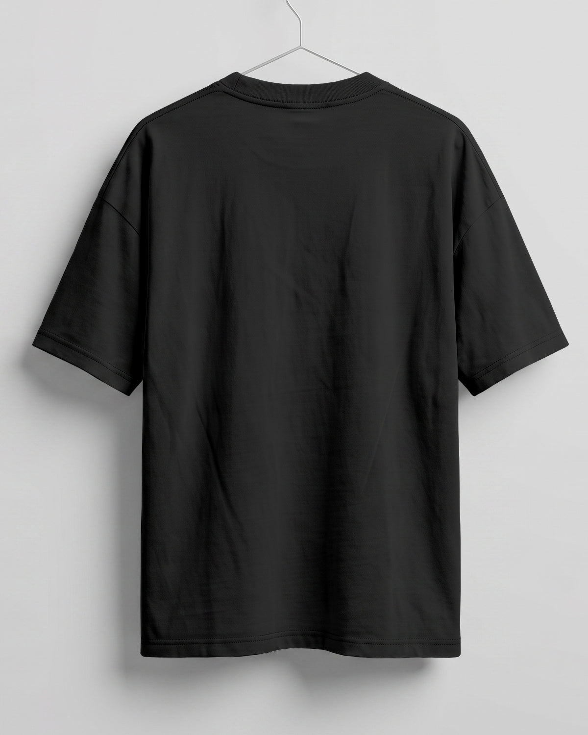 Black oversized plain half sleeve round neck t-shirt made from premium cotton 180 GSM red label yarn, biowashed for softness.