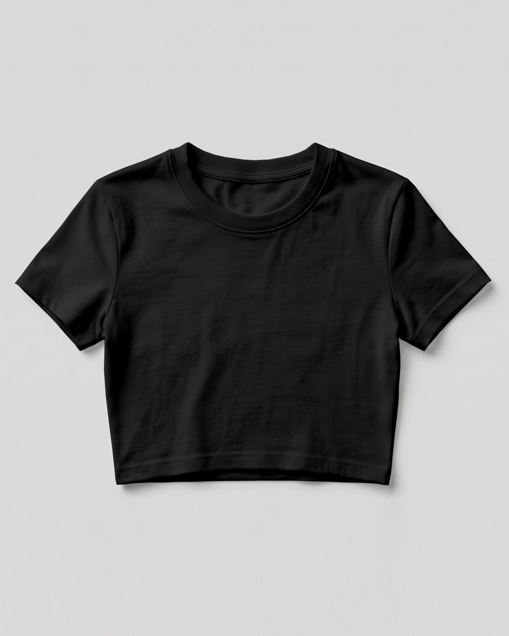 Black plain cotton crop top made from premium cotton, 180 GSM red label yarn, biowashed for softness and durability.