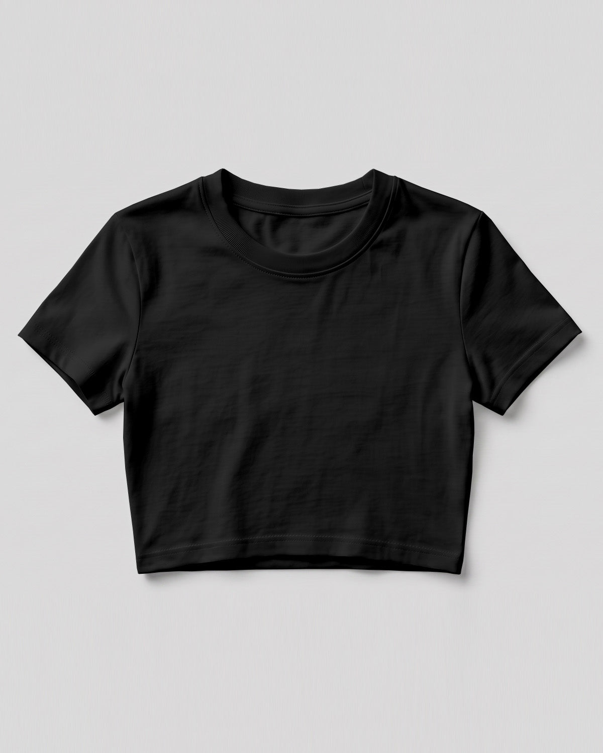 Black plain cotton crop top made from premium cotton, 180 GSM red label yarn, biowashed for softness and durability.
