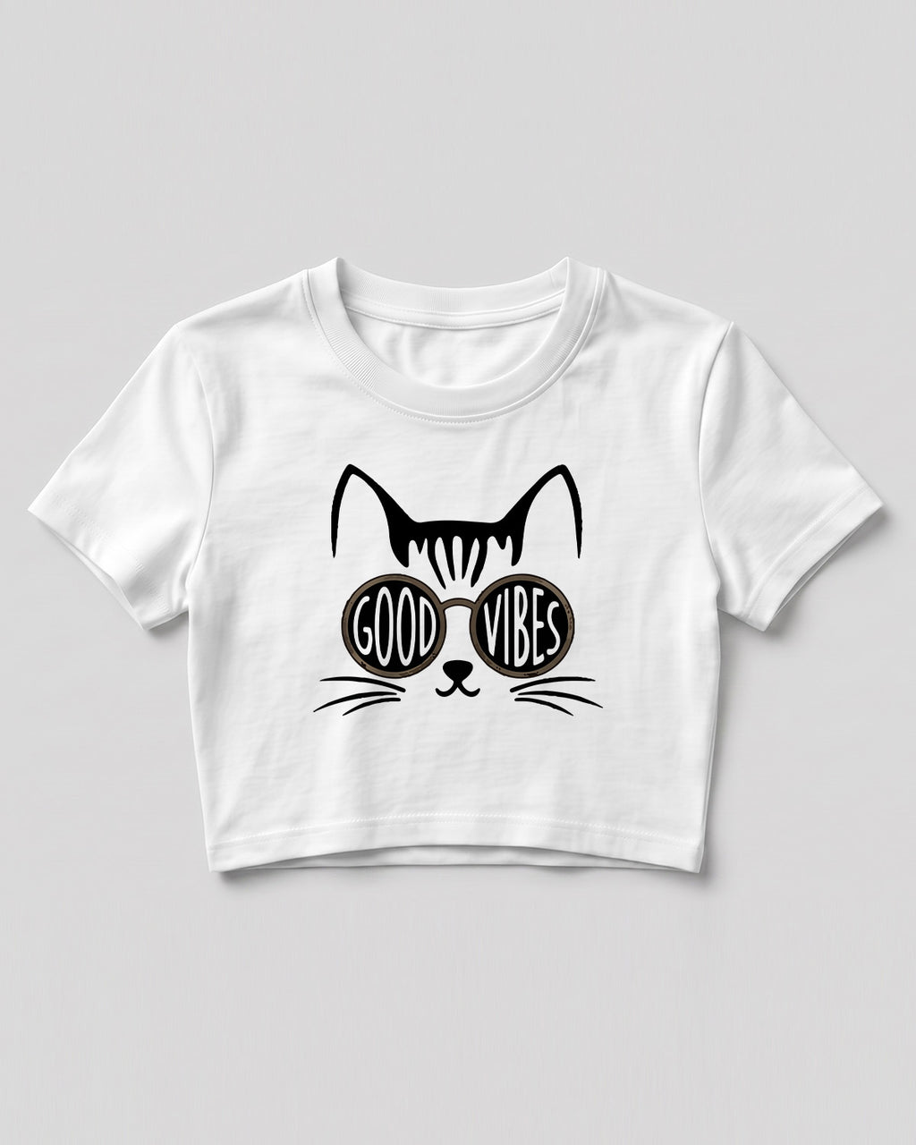 Graphic crop top featuring Good Vibes typography and cat with sunglasses design on cotton fabric