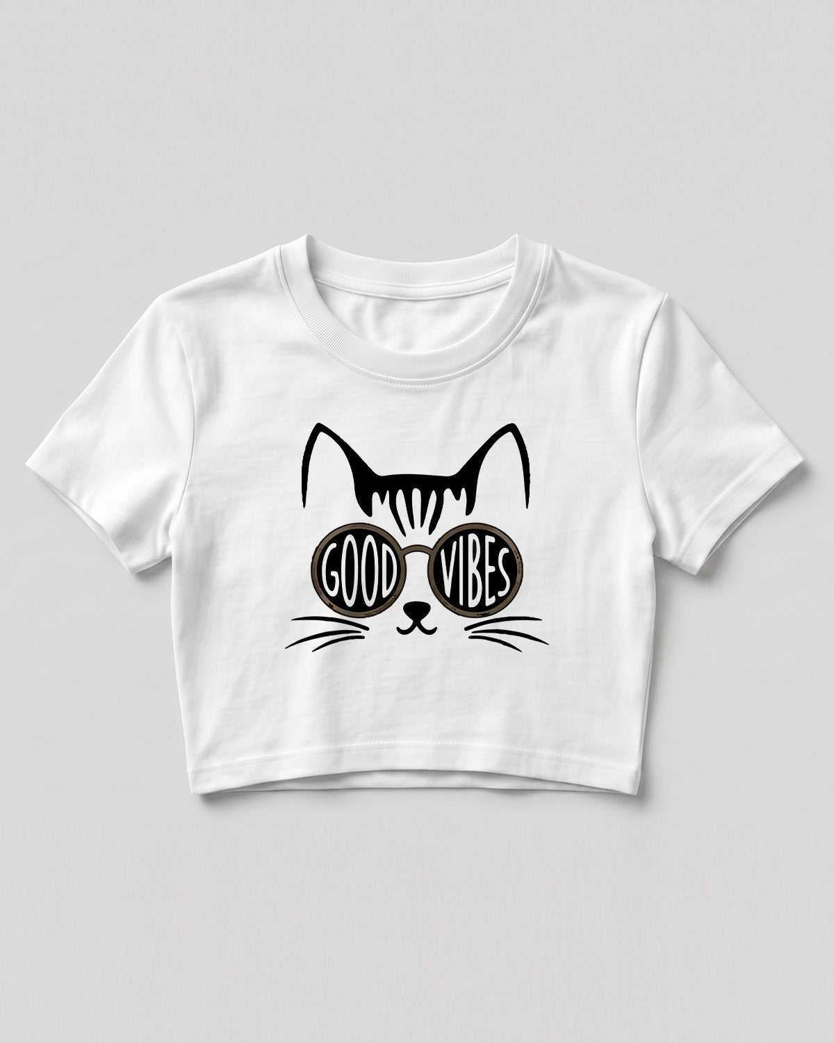 Graphic crop top featuring Good Vibes typography and cat with sunglasses design on cotton fabric