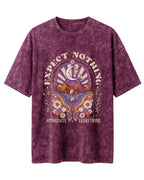 Oversized unisex acid washed t-shirt featuring “Expect Nothing” motivational typography print, crafted from 220 GSM cotton.