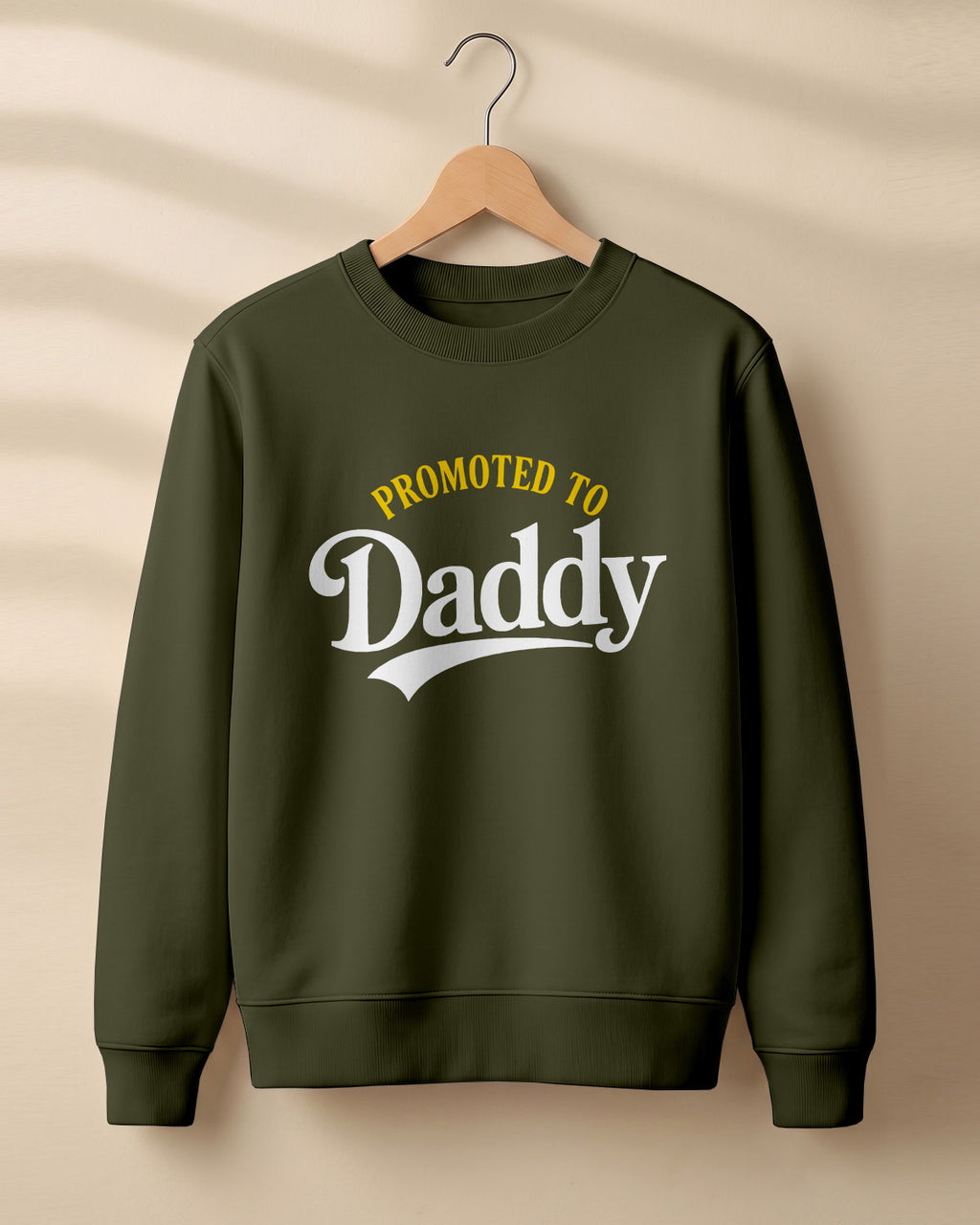 Xenovaurban graphic sweatshirt featuring “Promoted to Daddy” typography.
