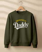 Xenovaurban graphic sweatshirt featuring “Promoted to Daddy” typography.