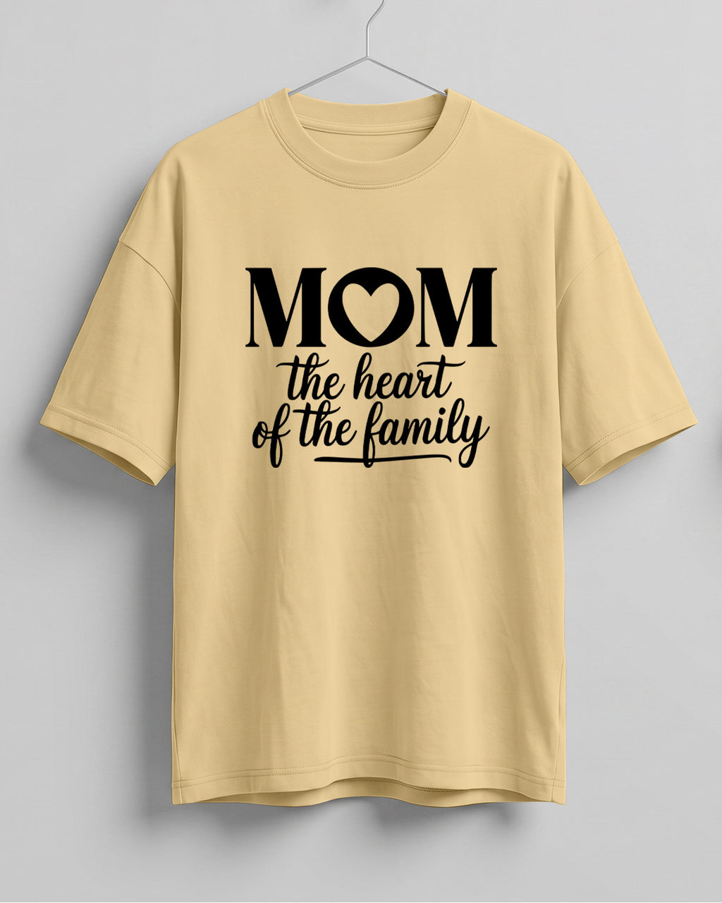 Xenovaurban oversized graphic T-shirt featuring Mom The Heart of the Family typography with a heart detail