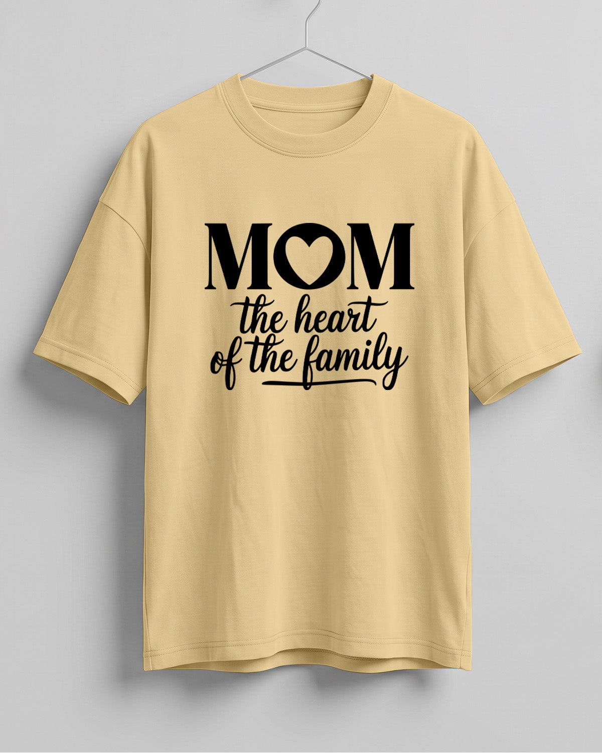 Xenovaurban oversized graphic T-shirt featuring Mom The Heart of the Family typography with a heart detail