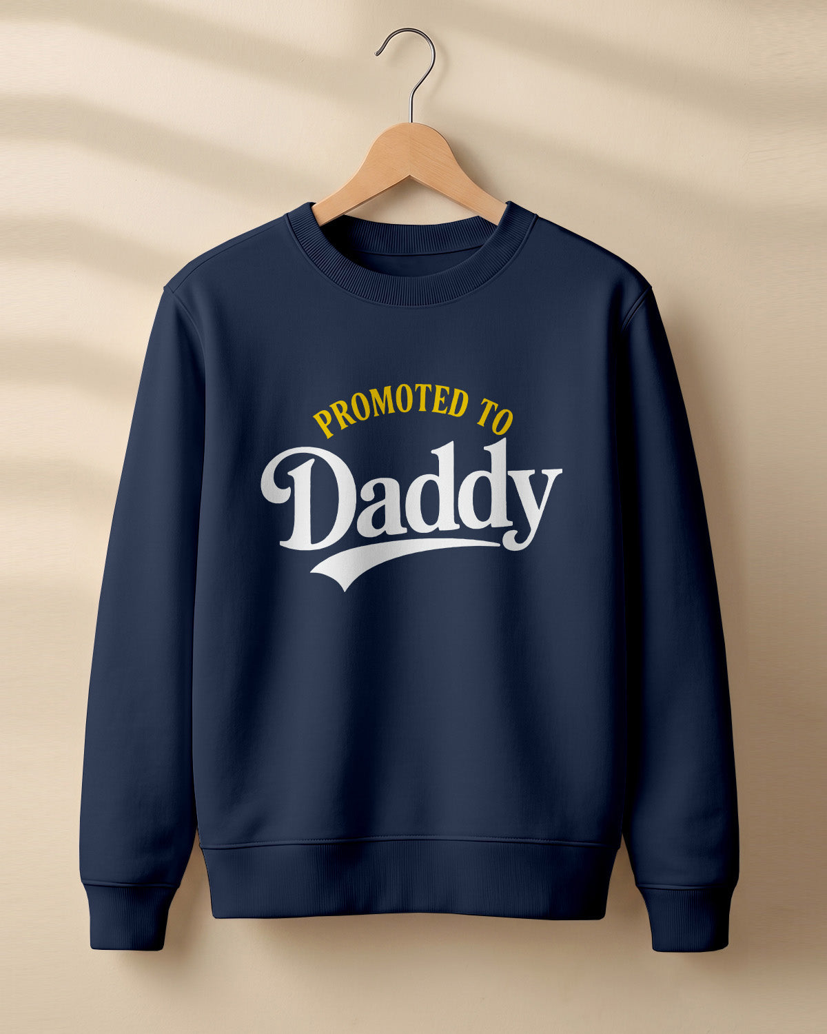 Xenovaurban graphic sweatshirt featuring “Promoted to Daddy” typography.