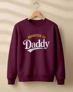 Xenovaurban graphic sweatshirt featuring “Promoted to Daddy” typography.