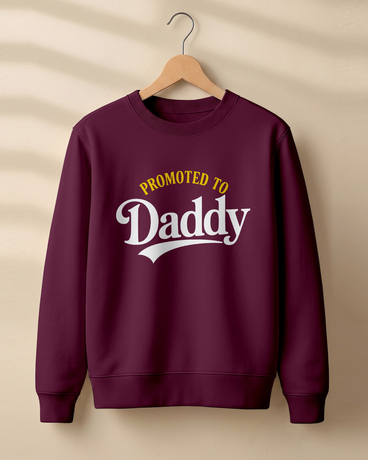 Xenovaurban graphic sweatshirt featuring “Promoted to Daddy” typography.