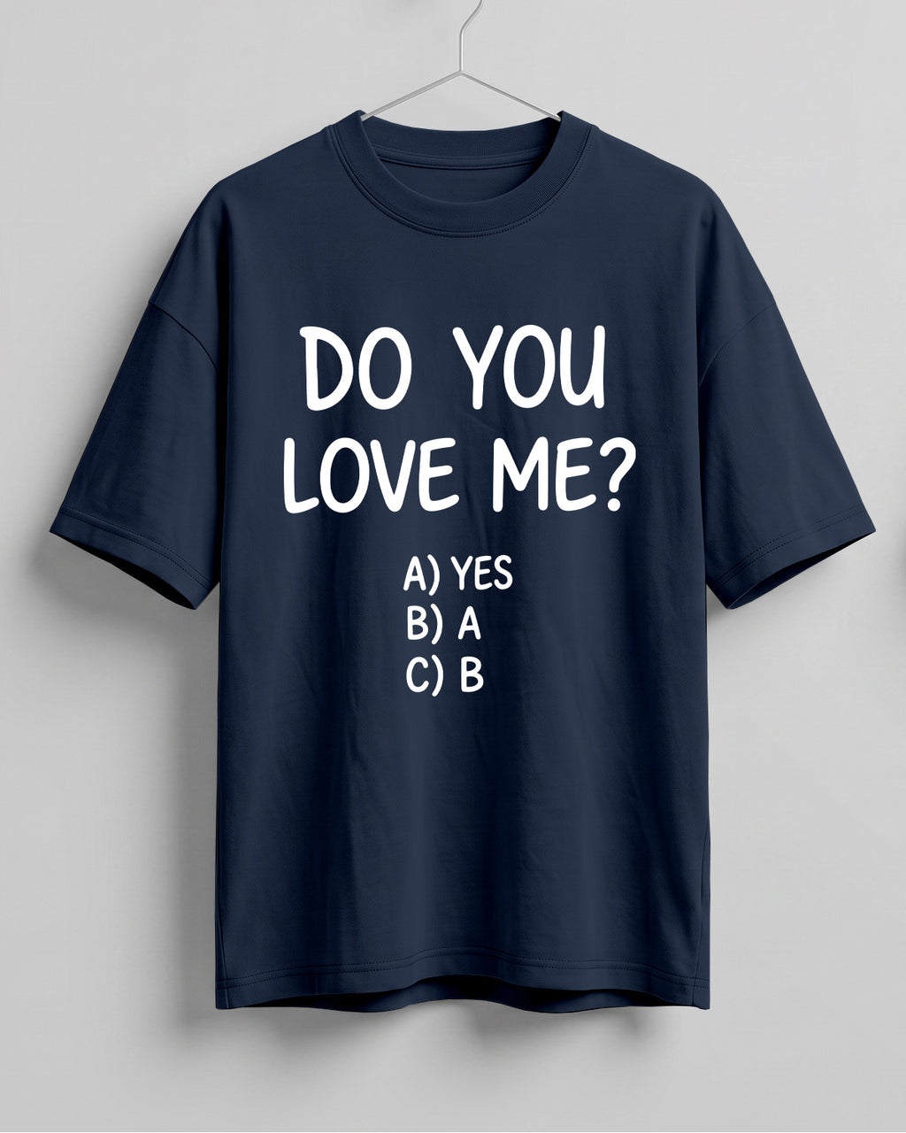 Funny graphic half sleeve oversized t-shirt featuring Do You Love Me? quote with cheeky multiple choice options on cotton fabric
