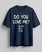 Funny graphic half sleeve oversized t-shirt featuring Do You Love Me? quote with cheeky multiple choice options on cotton fabric