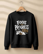 Motivational graphic sweatshirt featuring relaxed cat wearing sunglasses artwork with Focus on Progress, Not Perfection quote printed on cotton fabric