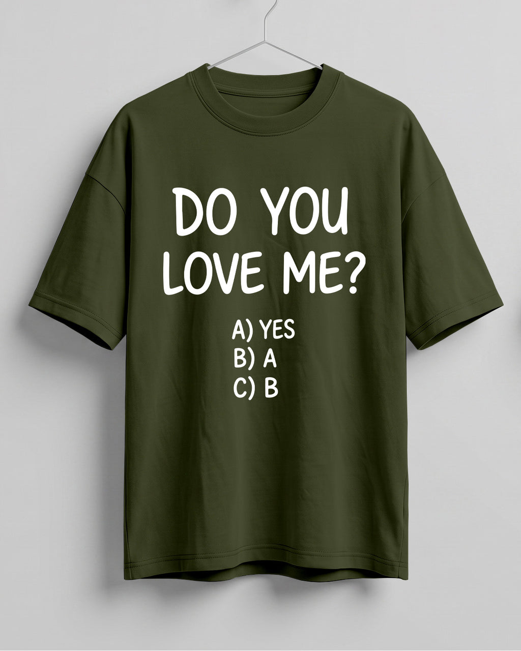 Funny graphic half sleeve oversized t-shirt featuring Do You Love Me? quote with cheeky multiple choice options on cotton fabric