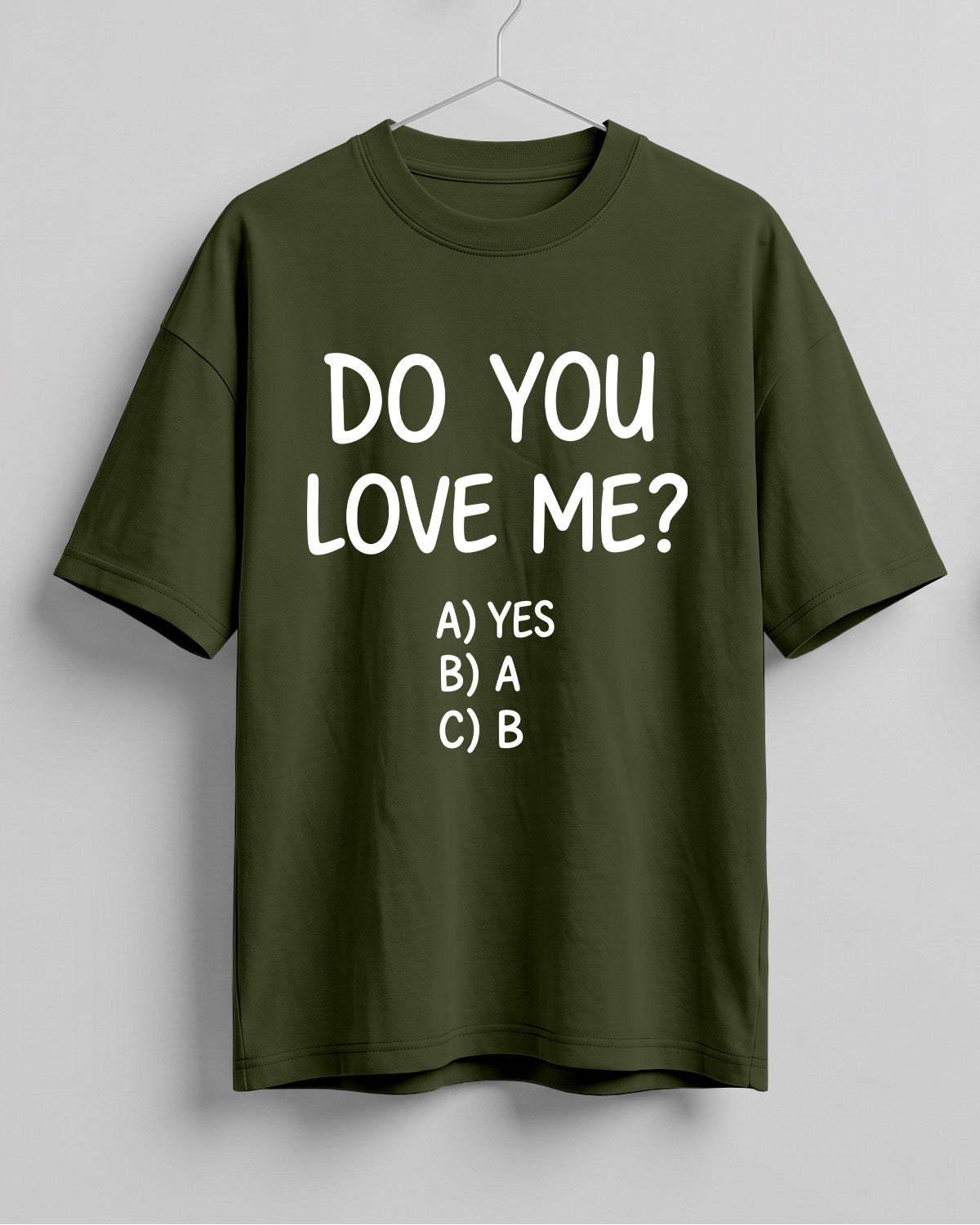 Funny graphic half sleeve oversized t-shirt featuring Do You Love Me? quote with cheeky multiple choice options on cotton fabric