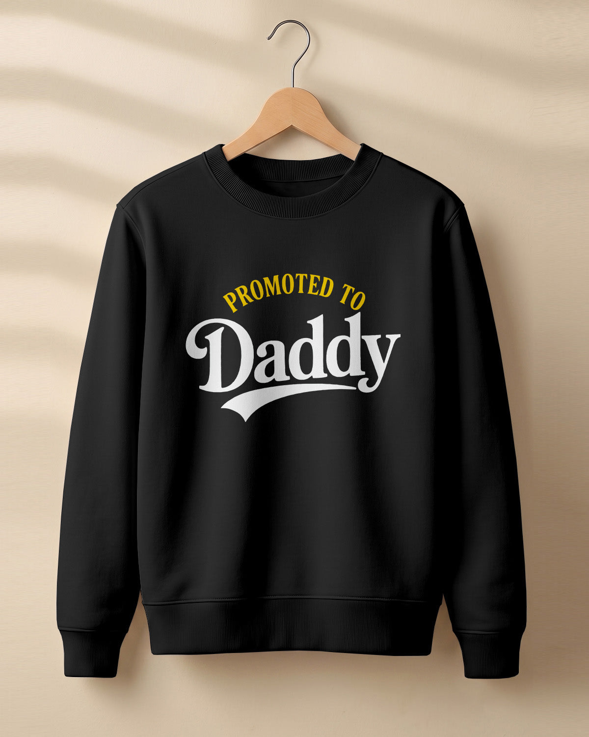 Xenovaurban graphic sweatshirt featuring “Promoted to Daddy” typography.