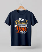 Motivational quote graphic half sleeve t-shirt featuring Be Proud Of Who You Are typography design on navy blue cotton fabric