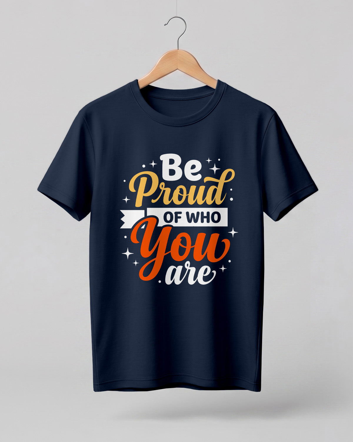 Motivational quote graphic half sleeve t-shirt featuring Be Proud Of Who You Are typography design on navy blue cotton fabric