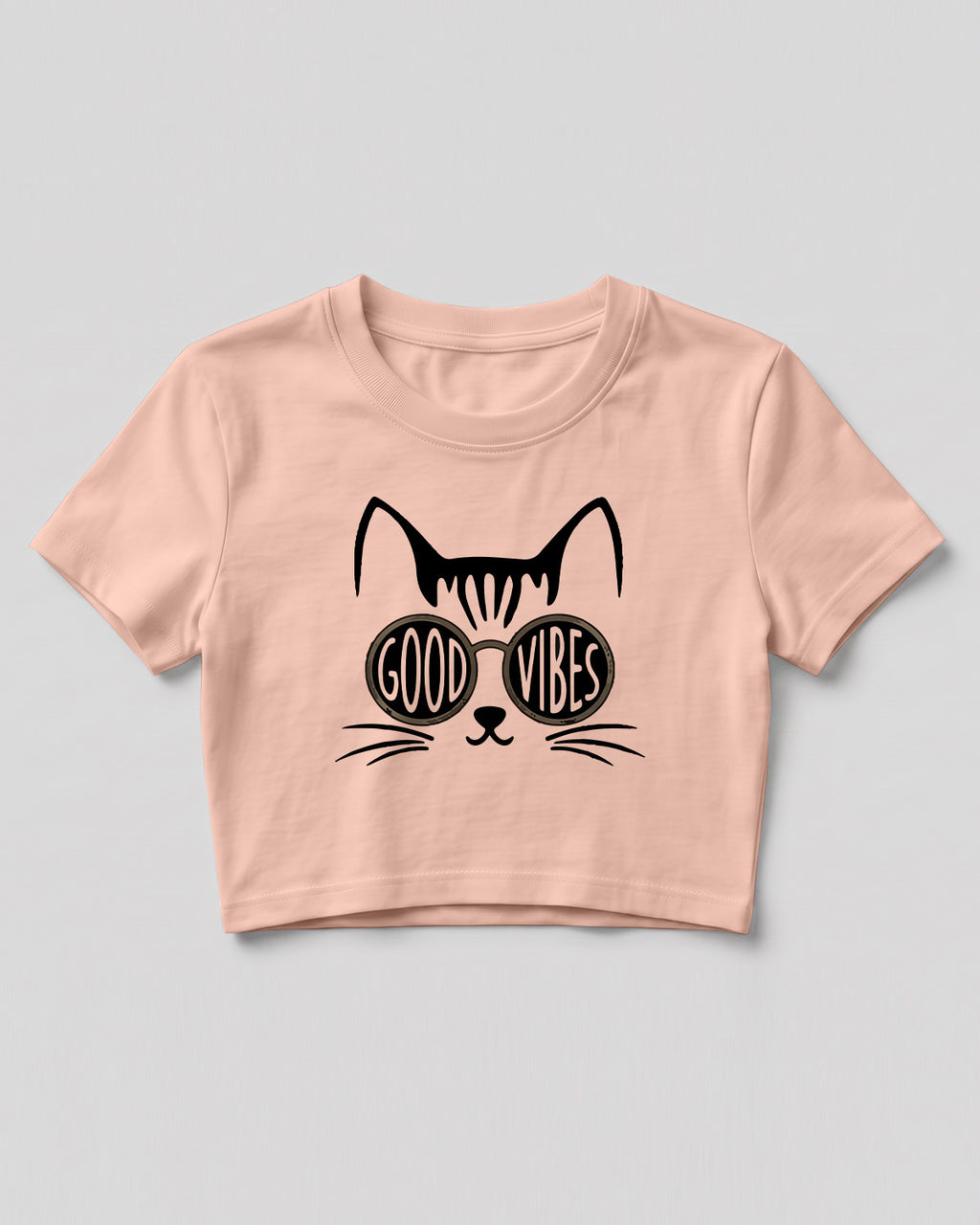 Graphic crop top featuring Good Vibes typography and cat with sunglasses design on cotton fabric