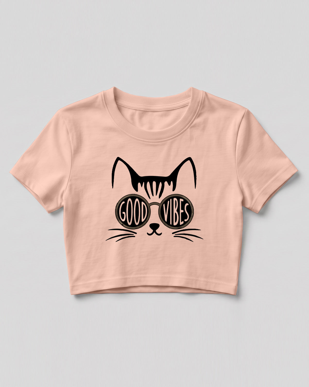 Graphic crop top featuring Good Vibes typography and cat with sunglasses design on cotton fabric