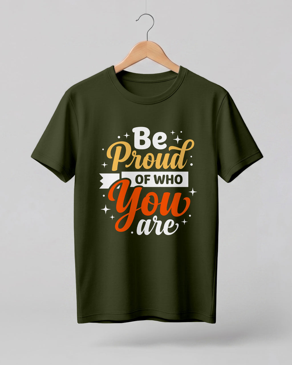 Motivational quote graphic half sleeve t-shirt featuring Be Proud Of Who You Are typography design on olive green cotton fabric