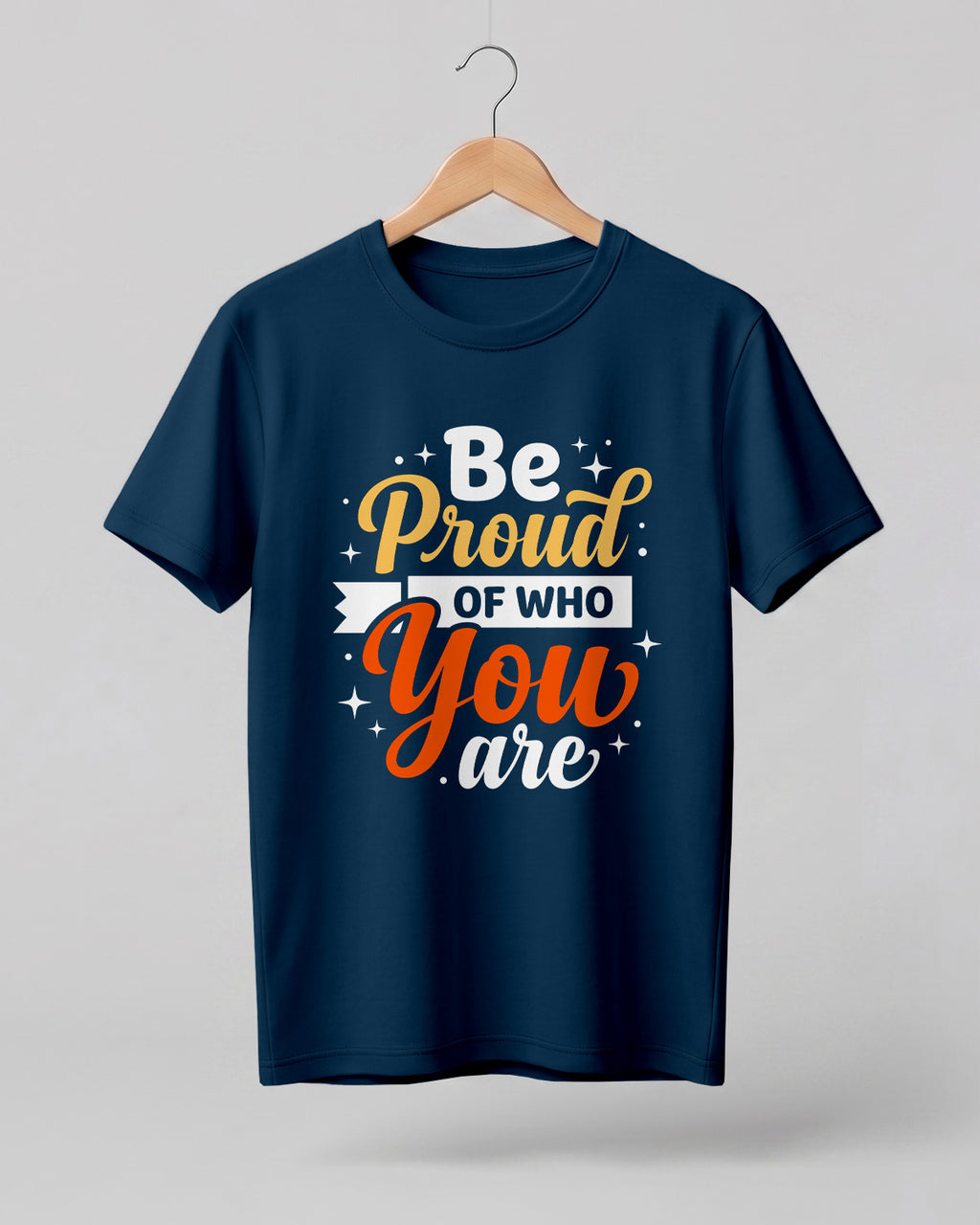 Motivational quote graphic half sleeve t-shirt featuring Be Proud Of Who You Are typography design on petrol blue cotton fabric