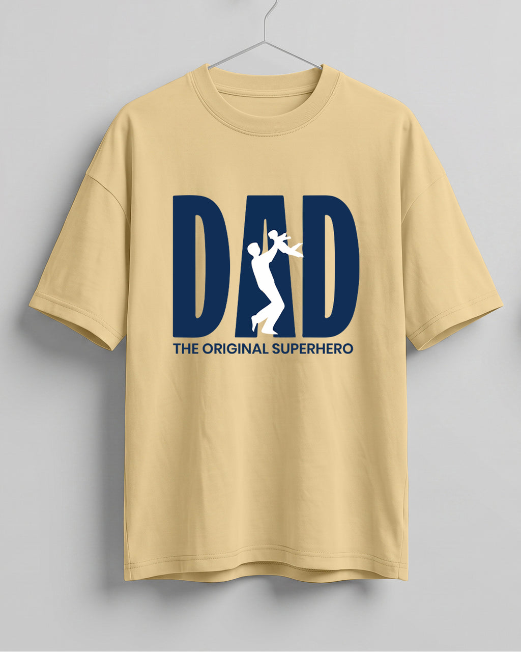 Oversized unisex t-shirt with “Dad – The Original Superhero” typography print, crafted from 220 GSM cotton, bio‑washed and pre‑shrunk.