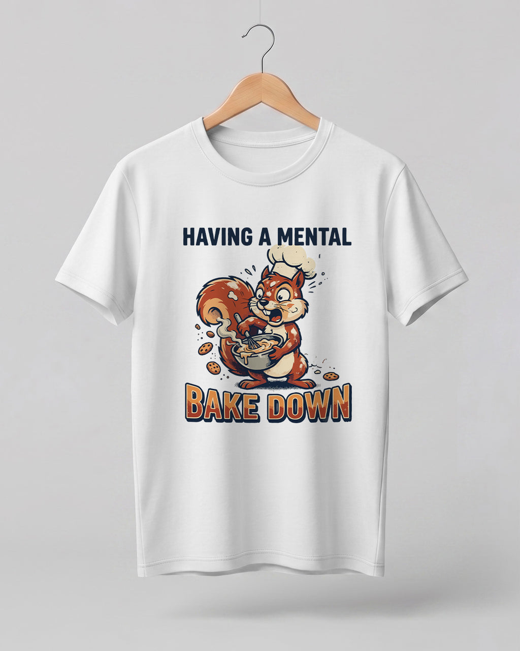 Foodie graphic half sleeve t-shirt featuring cartoon squirrel baking illustration with “Having a Mental Bake Down” typography printed on premium cotton fabric.