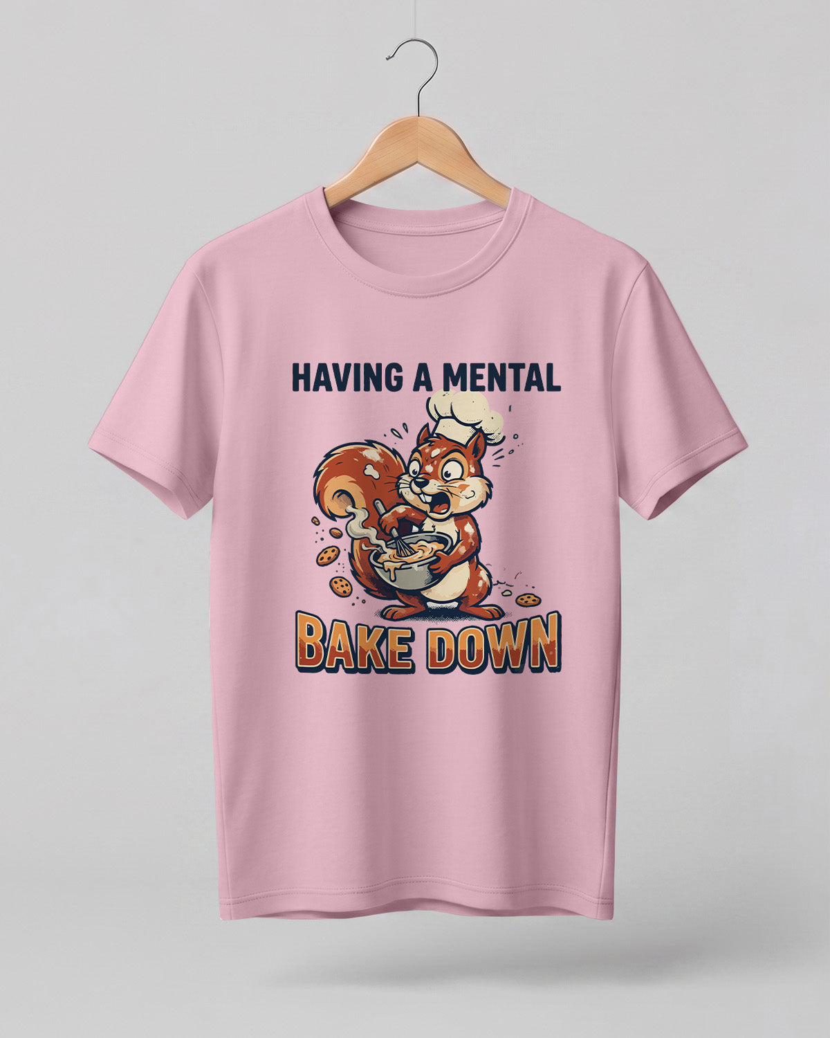 Foodie graphic half sleeve t-shirt featuring cartoon squirrel baking illustration with “Having a Mental Bake Down” typography printed on premium cotton fabric.