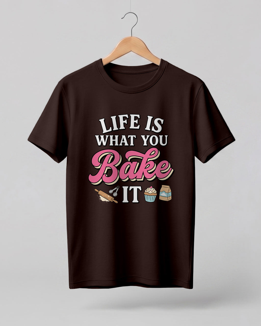 Foodie graphic half sleeve t-shirt featuring “Life Is What You Bake It” typography with colorful baking illustrations printed on premium cotton fabric.