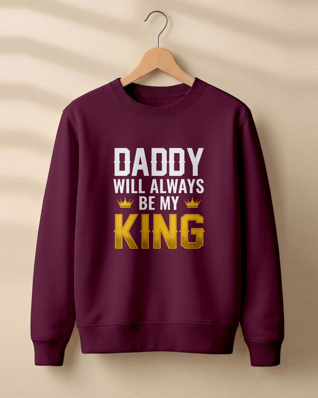 Xenovaurban graphic sweatshirt featuring “Daddy Will Always Be My King” typography and crown illustration