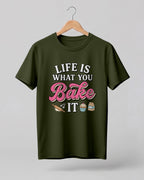 Foodie graphic half sleeve t-shirt featuring “Life Is What You Bake It” typography with colorful baking illustrations printed on premium cotton fabric.