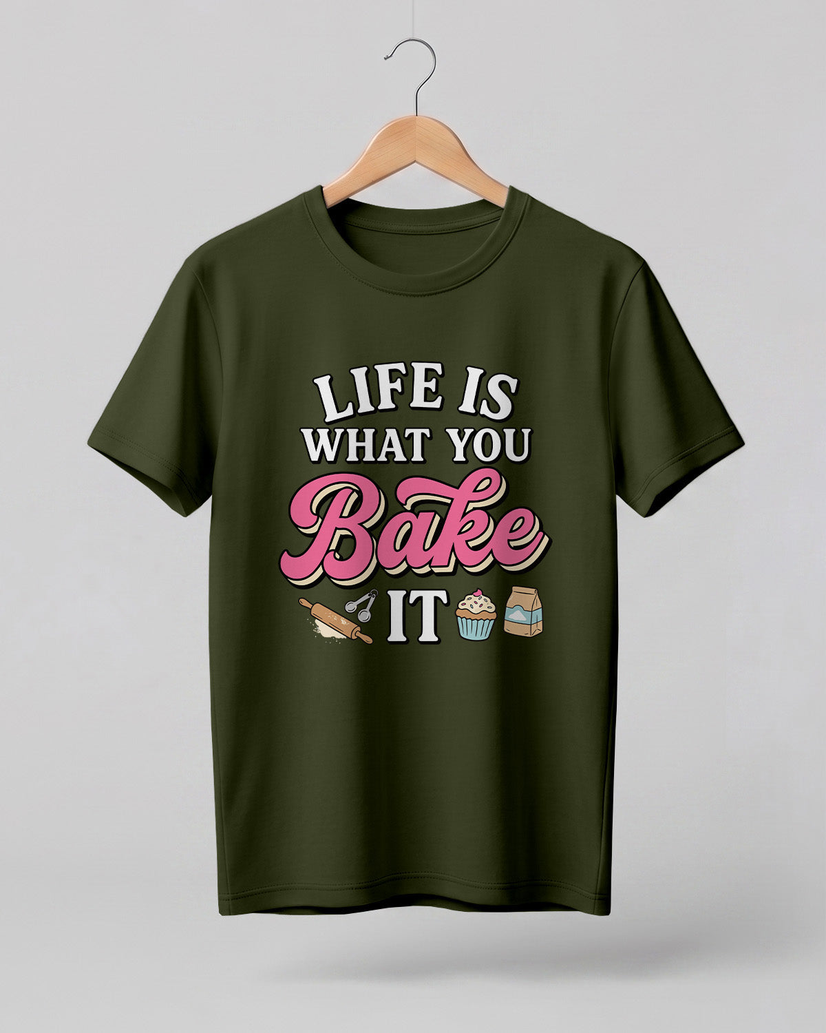 Foodie graphic half sleeve t-shirt featuring “Life Is What You Bake It” typography with colorful baking illustrations printed on premium cotton fabric.