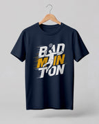 Motivational sports graphic half sleeve t-shirt featuring bold “Badminton” typography with dynamic player silhouette printed on premium cotton fabric.