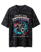 Oversized unisex t-shirt with “Trust The Universe” motivational typography print, crafted from 220 GSM cotton, acid washed.