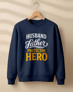 Xenovaurban 300 GSM cotton crewneck sweatshirt featuring Husband Father Protector Hero typography in contrasting lettering
