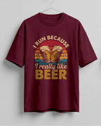 Xenovaurban oversized T-shirt featuring I Run Because I Really Like Beer typography and beer mug graphics