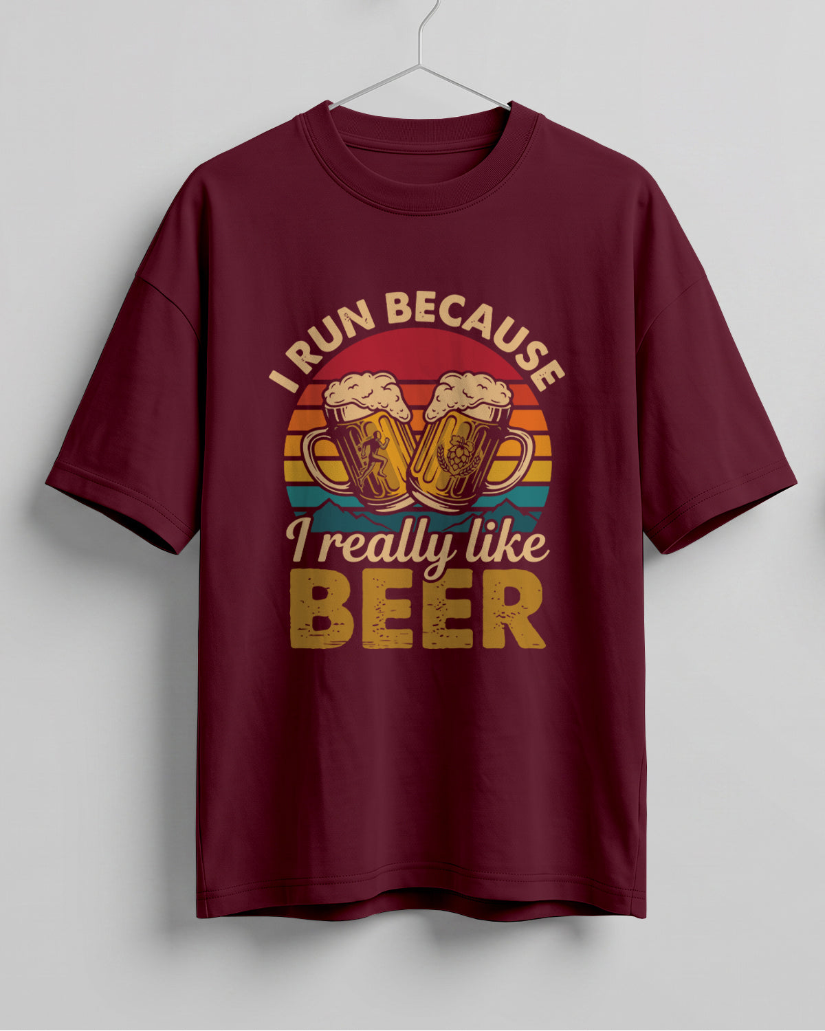 Xenovaurban oversized T-shirt featuring I Run Because I Really Like Beer typography and beer mug graphics