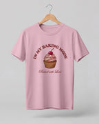 Foodie graphic half sleeve t-shirt featuring cupcake illustration with “In My Baking Mode” and “Baked with Love” typography printed on premium cotton fabric.