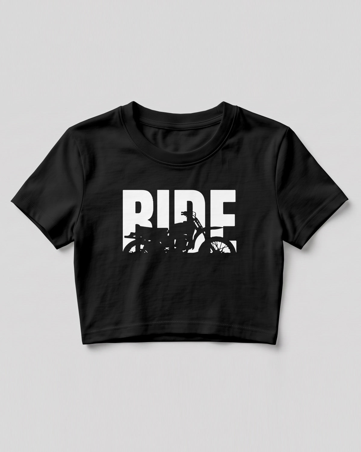 Xenovaurban crop top featuring oversized RIDE typography with a motorcycle silhouette integrated into the design