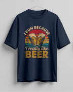 Xenovaurban oversized T-shirt featuring I Run Because I Really Like Beer typography and beer mug graphics