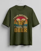 Xenovaurban oversized T-shirt featuring I Run Because I Really Like Beer typography and beer mug graphics