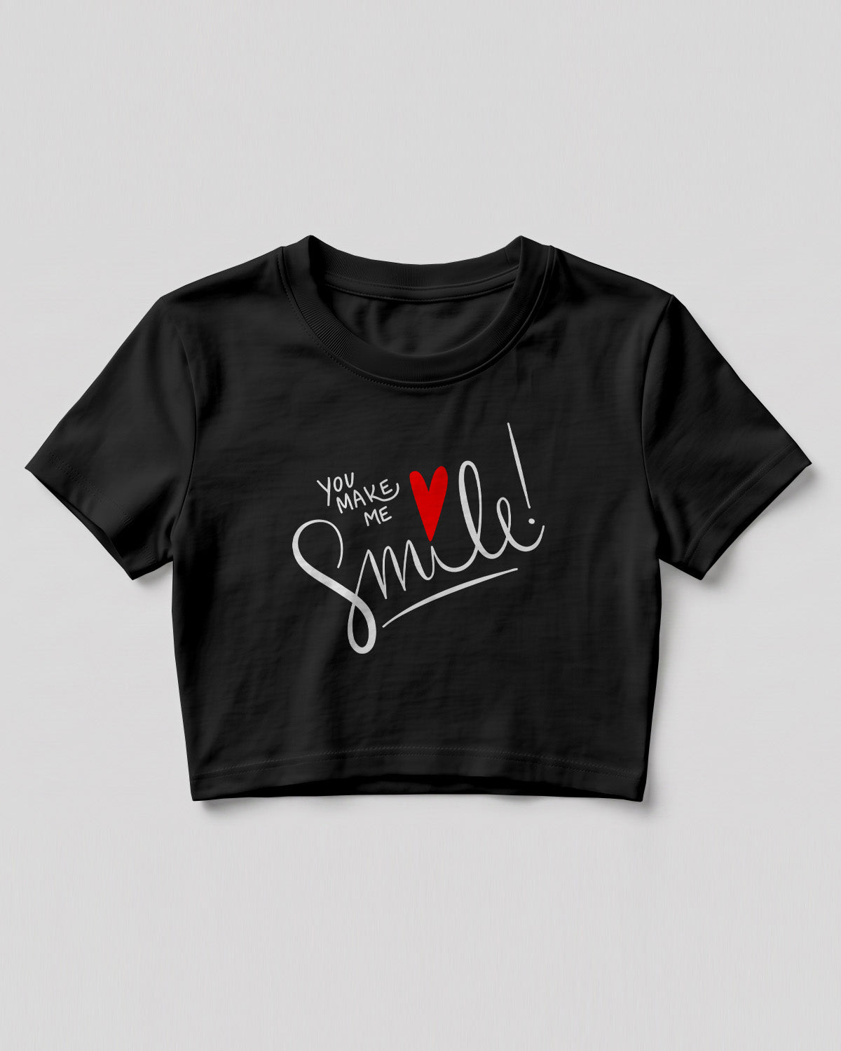 Motivational graphic crop top featuring You Make Me Smile typography design with heart graphic on cotton fabric