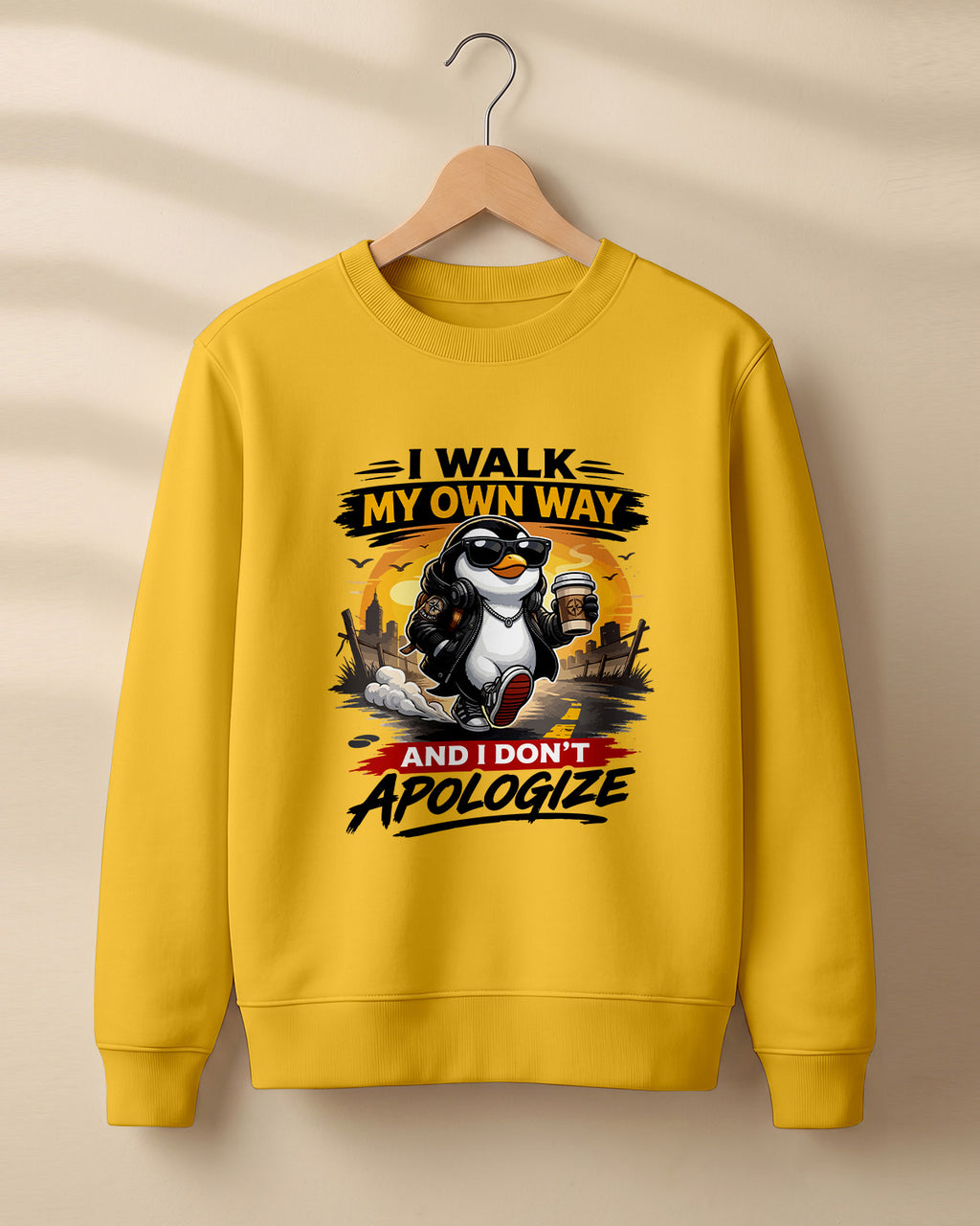 Sarcastic graphic sweatshirt featuring cool penguin artwork with I Walk My Own Way and I Don't Apologize quote printed on premium cotton fabric