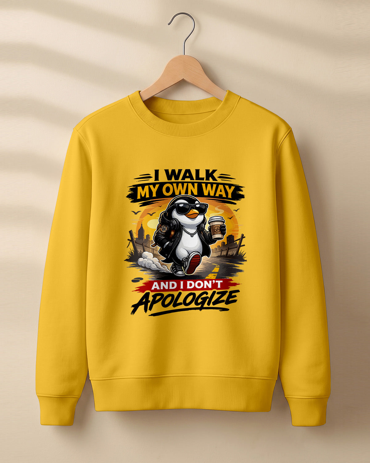 Sarcastic graphic sweatshirt featuring cool penguin artwork with I Walk My Own Way and I Don't Apologize quote printed on premium cotton fabric
