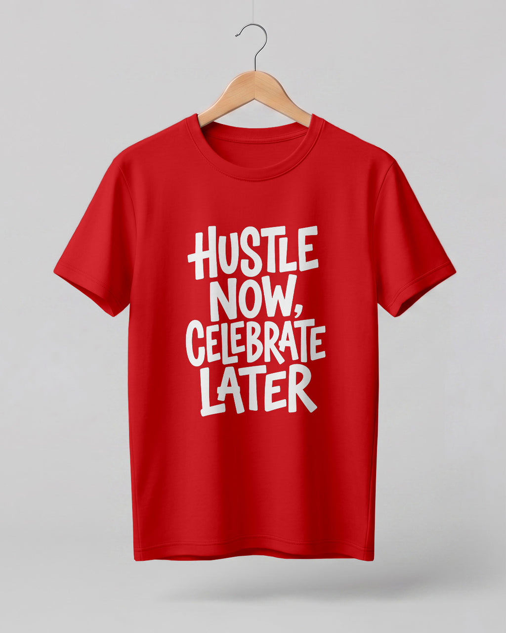 Motivational quote graphic half sleeve t-shirt featuring Hustle Now Celebrate Later typography design on premium cotton fabric
