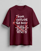 Graphic half sleeve oversized t-shirt featuring Think Outside the Box quote with tic-tac-toe graphic on cotton fabric