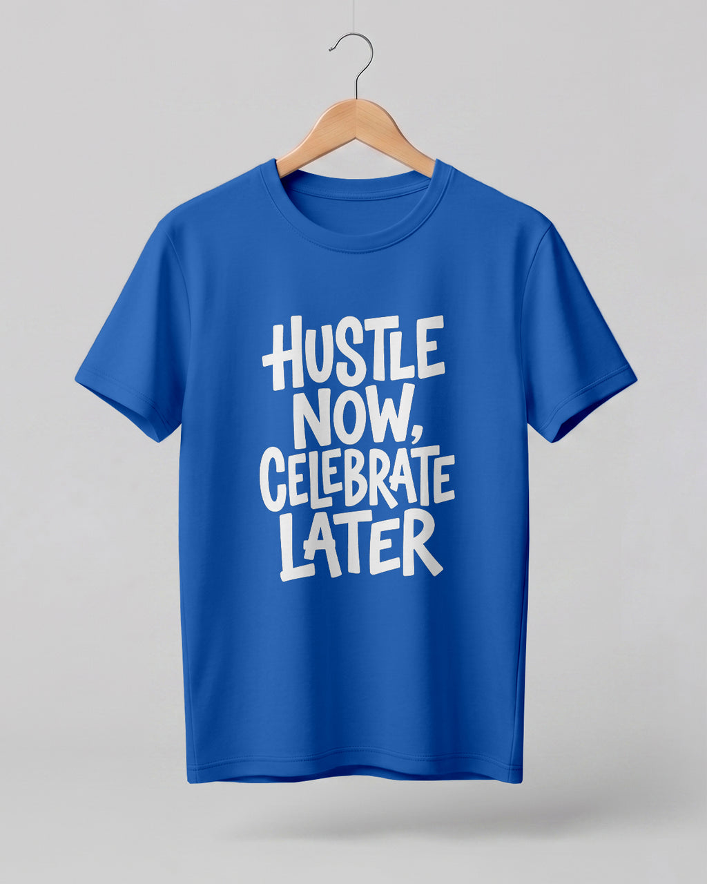 Motivational quote graphic half sleeve t-shirt featuring Hustle Now Celebrate Later typography design on premium cotton fabric