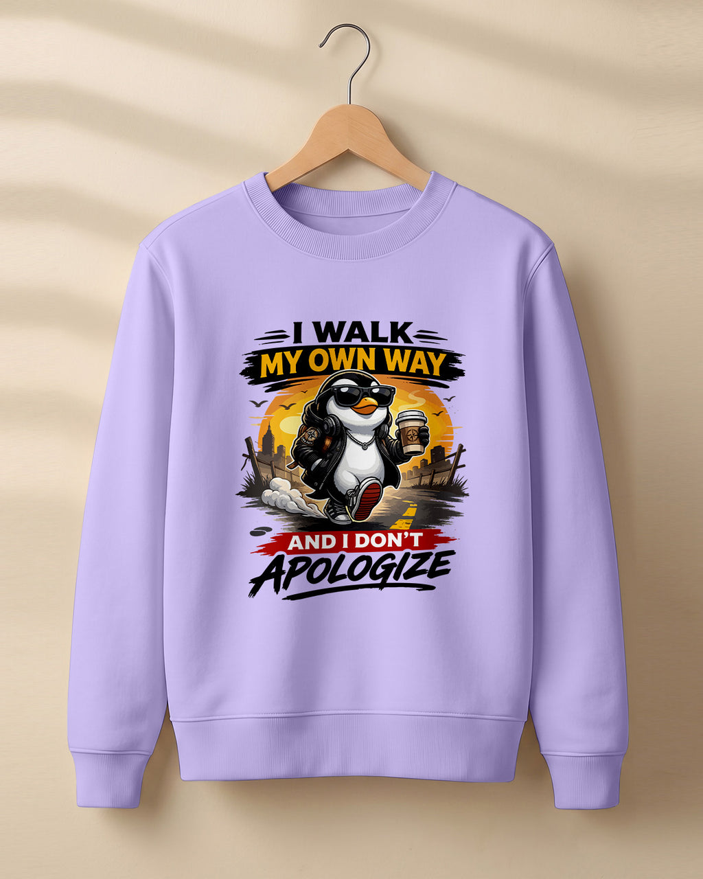 Sarcastic graphic sweatshirt featuring cool penguin artwork with I Walk My Own Way and I Don't Apologize quote printed on premium cotton fabric